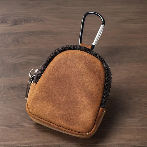 Porte-monnaie zippé en cuir marron pour homme, vu de face